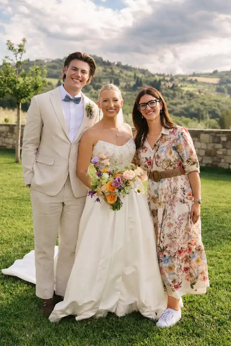 Claudia Magni with Briana and Christiaan on their wedding day in Chianti